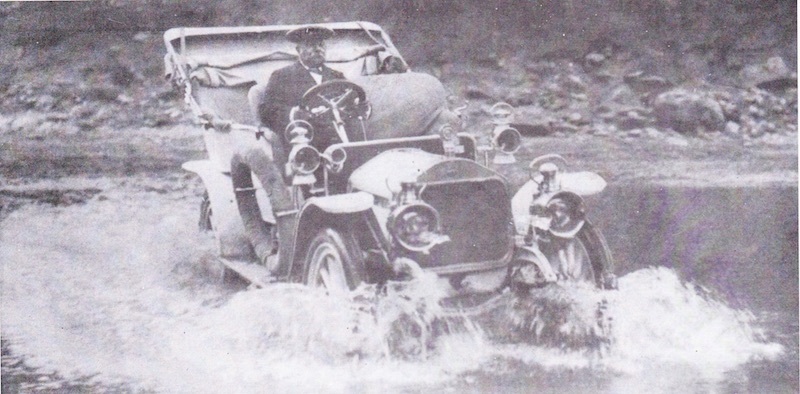 Dr. Russel of Oudtshoorn in his 1902 Wolseley Siddeley crossing one of the drifts at Meiringspoort.