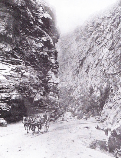 Horse cart crossing one of the streams at Double Drift in Meiringspoort Horse cart crossing one of the streams at Double Drift in Meiringspoort
